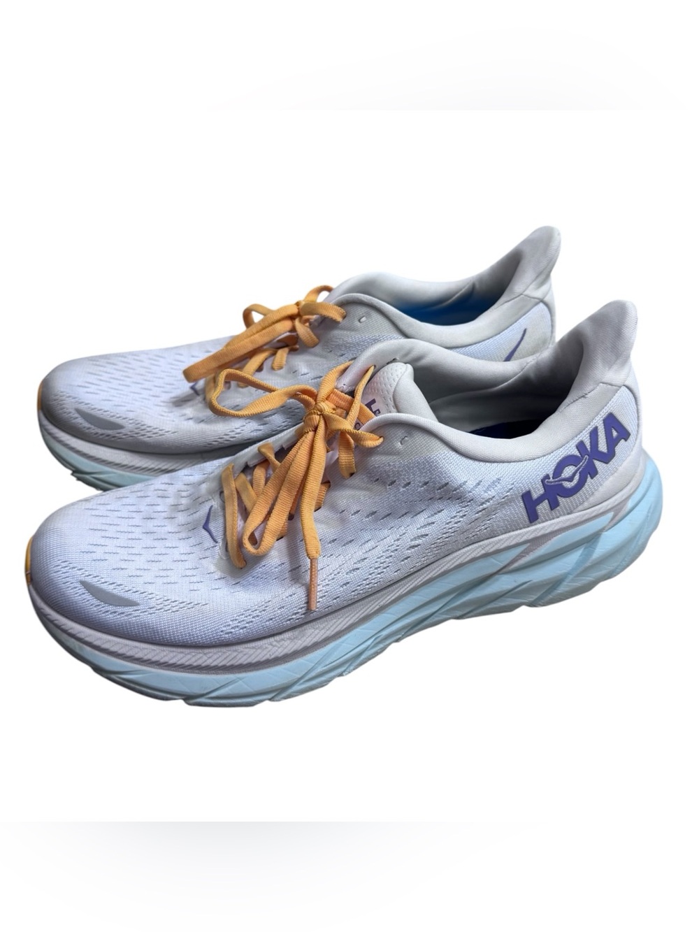 Hoka One One White Running Shoes with Lavender Logo and Orange Laces